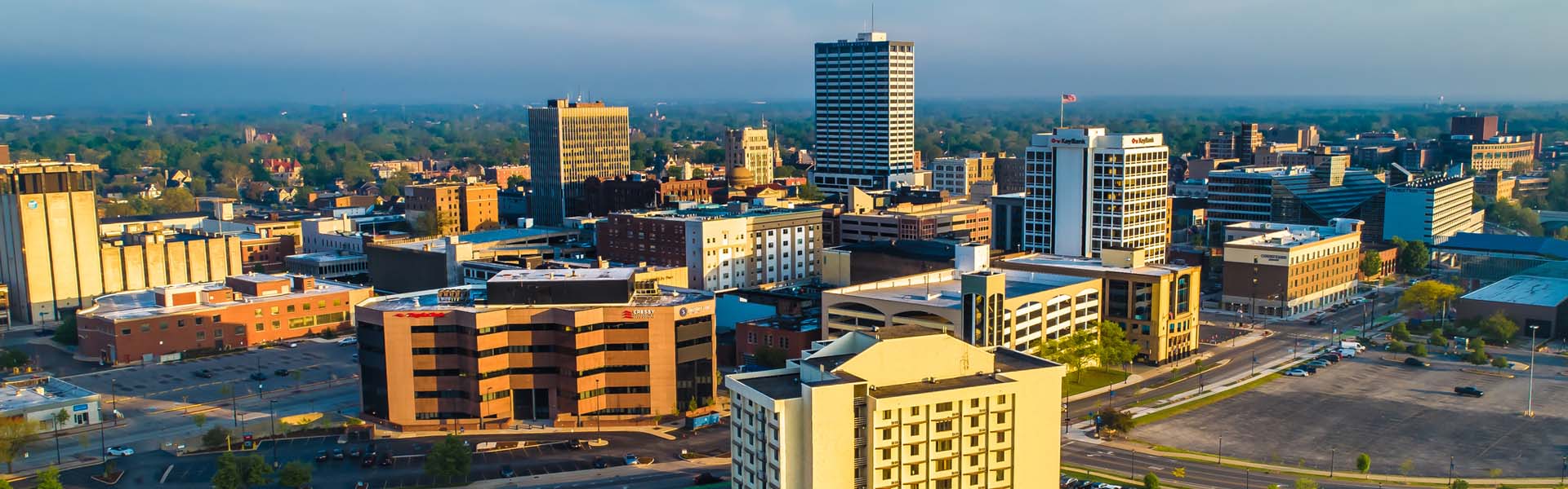 Neon color image of a band playing and people singing along