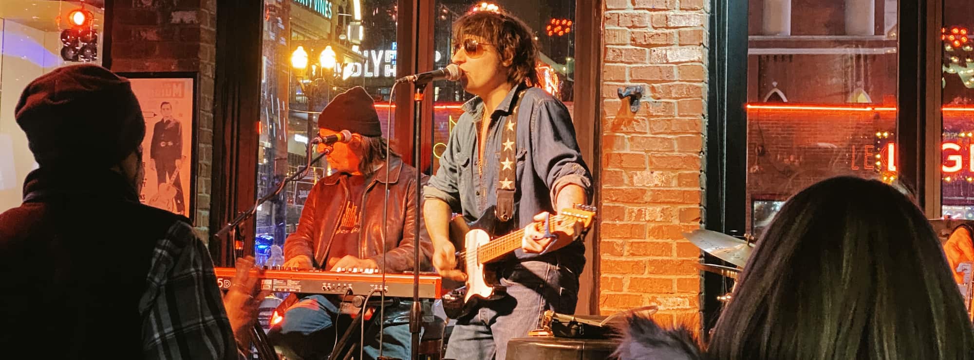 bar singer on guitar in South Bend